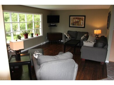 Living room with beautiful bay window.