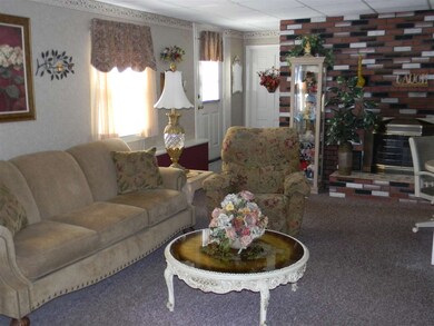Looking toward the working fireplace with blower.