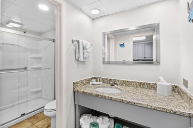 Bathroom with vanity, tile floors and a walk-in sh