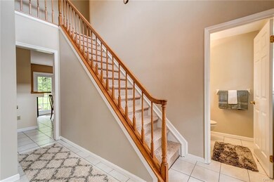 1/2 Bath located conveniently off the Foyer.
