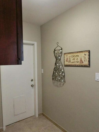 Laundry room with new upper cabinets