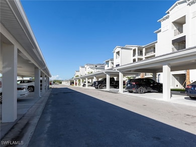 View of asphalt road featuring a residential view