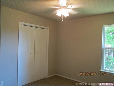 First Bedroom features new ceiling fan and fresh p