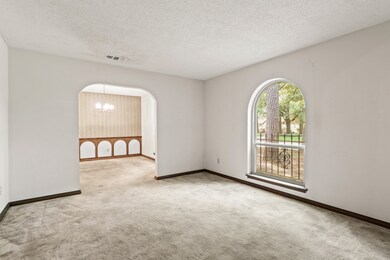 This fabulous den/formal living room provides
a c