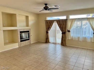 Unfurnished living room featuring visible vents, a