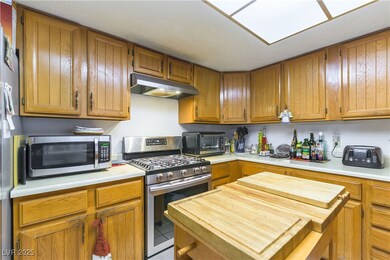Kitchen featuring appliances with stainless steel