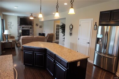 This view of the kitchen shows off the shape of th