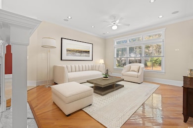 Living room with hardwood / wood-style floors, cei
