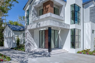 View of exterior entry with stucco siding