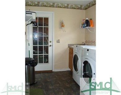Laundry Room. Great laundry room/mud room. Doors t