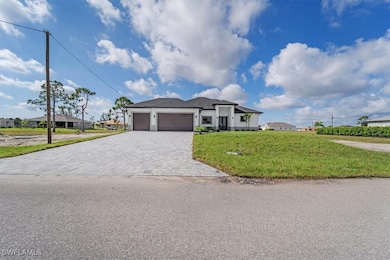 View of front of home with an attached garage, dec