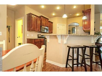 Kitchen. Addition seating at the breakfast bar. Great for entertaining your guests while you cook!