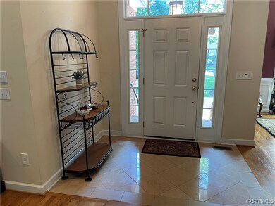 Entrance foyer with marble tile flooring