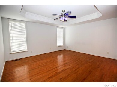 First floor master bedroom with lovely floors, a t