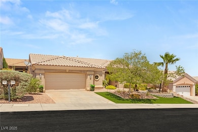View of front of house with an attached garage, st