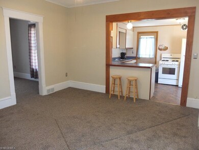 Dining room and kitchen.