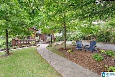 Mature landscape and main level parking for two ca