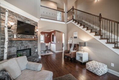 View from Great Room towards the Dining Room and upstairs. 