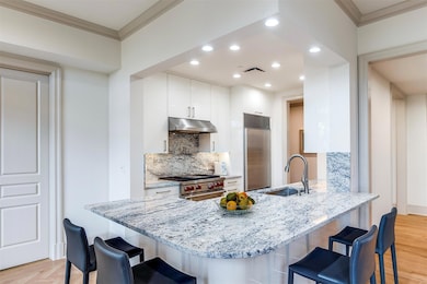 Kitchen features European cabinetry.