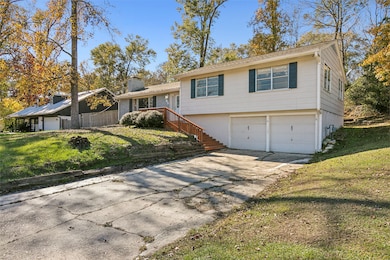 This photo shows a charming split-level home with