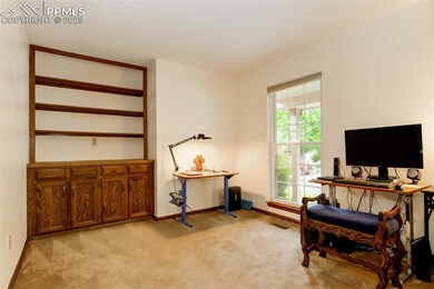 French doors lead you into this office with built 