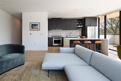 Living area featuring light wood finished floors 