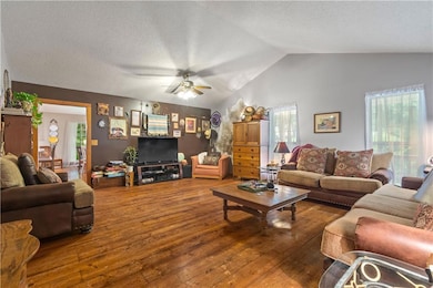 This room can be utilized as an oversized family room, or you can split it into a dining and living space.