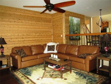 New furniture and ceiling fan with light.