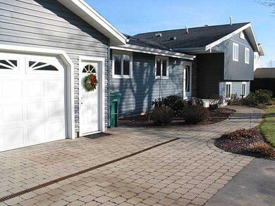 Exterior Front The Double Wide Paved and Paver Dri