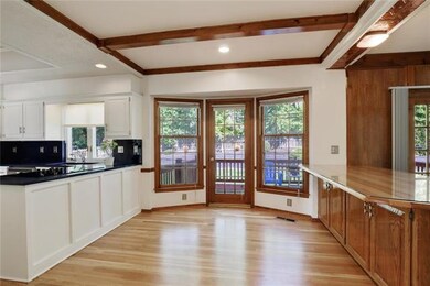 Breakfast area off kitchen, opens to deck.