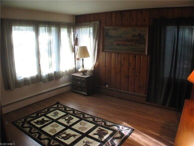 Mater bedroom with back yard and creek views.