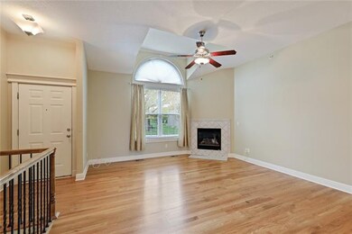 THE VAULTED CEILING AND CORNER FIREPLACE MAKE THE 