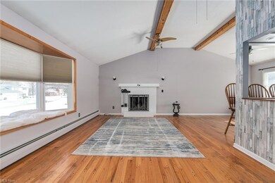 Updated vinyl windows.....wood flooring with a rus