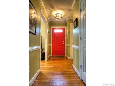 Foyer with coat closet + powder room