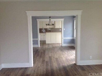 view from living room into dinning area and kitche