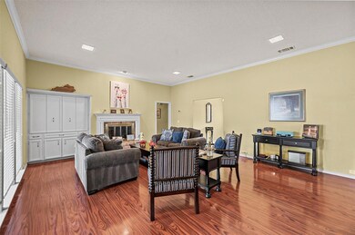 First living room complete with gas fireplace and 