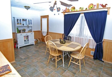 Eat-In-Kitchen with access to rear patio