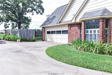 Large driveway with 2 car garage.