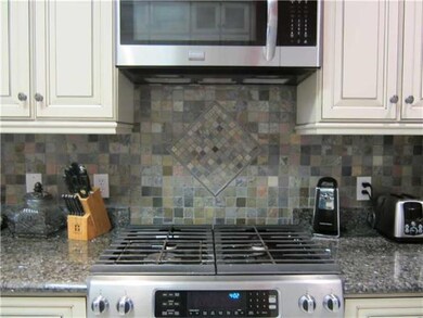Kitchen. Stove with decorative tile work