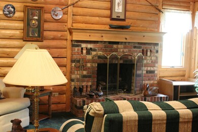 Living Room with Brick Fireplace