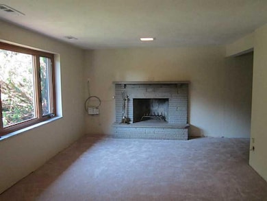 Family Room. Fireplace and picture window