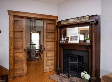 The original fireplace, though not functional, has