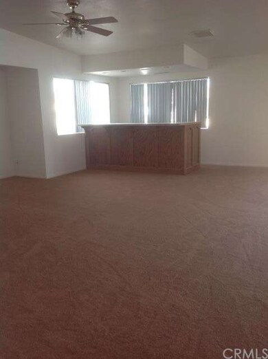 Bar area off living room. Looking out window to se