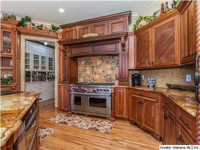 GOURMET kitchen with built-in subzero refrigerator