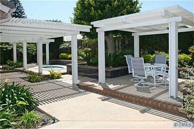 Walk through French doors from both living & famil