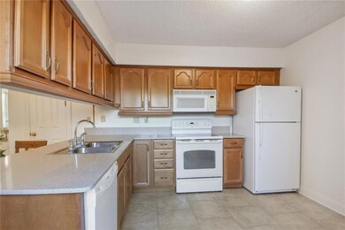 Pretty Corian c-tops. All appls remain.