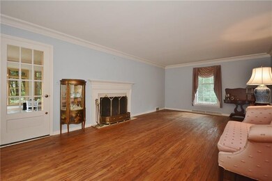 Gleaming hardwood floors in expansive living room 