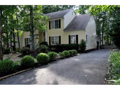 Long & wide paved driveway and side entry 2 car ga