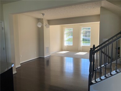 Family room next to kitchen and living room.