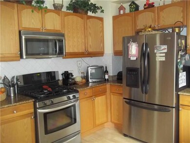 Kitchen. Stainless appliances gleam in this effici